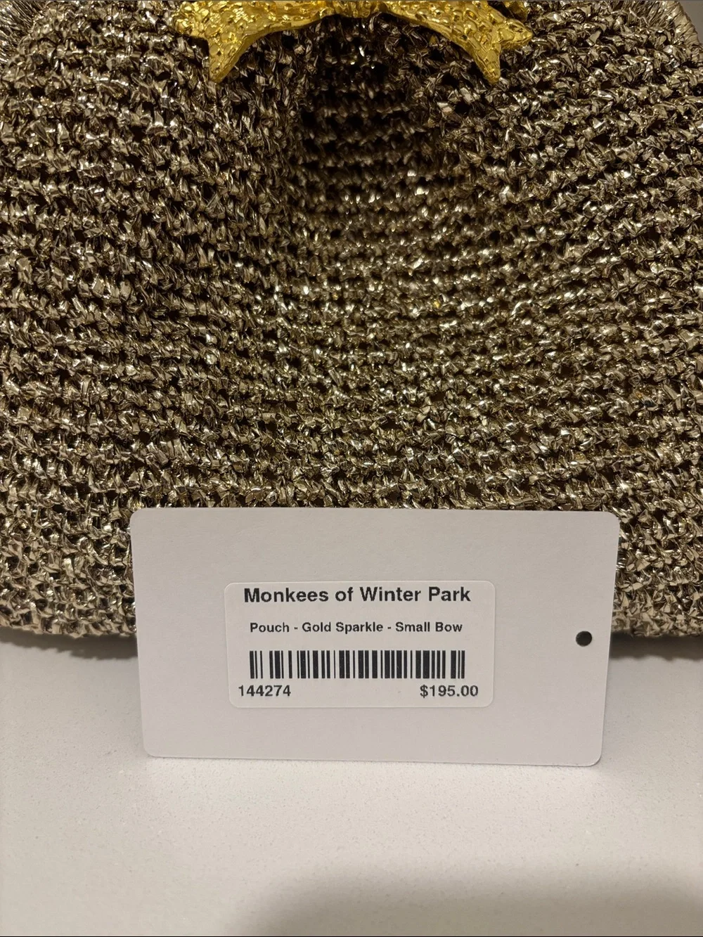 NWT Monkees of Winter Park Metallic Gold Bow Accent Clutch